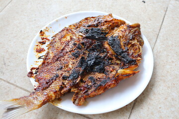 Ikan bakar. Grilled fish.