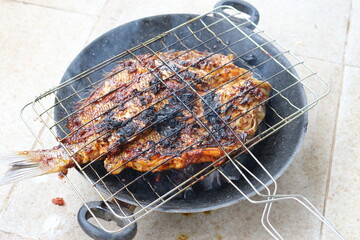 Ikan bakar. Grilled fish.
