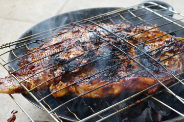 Ikan bakar. Grilled fish.