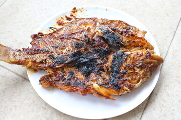 Ikan bakar. Grilled fish.