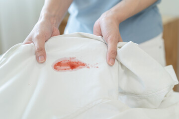 Prepare before laundry, Stain of jam on the white shirt.