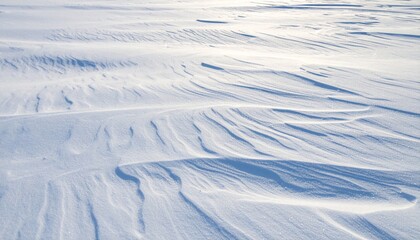 Wintry White Snowscape with Textured Surface and Drifting Patterns on a Sunny Day