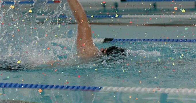 Swimmer lifting right arm starting backstroke training for speed with motion arrows showing pull