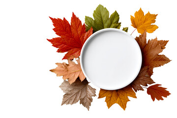 Seasonal centerpiece with autumn leaves and plate