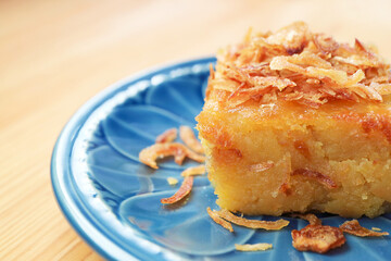 Closeup of Khanom Mo Kaeng, a Delicious Thai Custard Made of Mung Beans Garnished with Crispy Fried Shallots