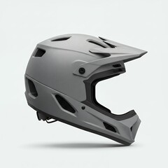 Fototapeta premium Modern gray full-face mountain bike helmet with streamlined profile ventilation system and protective chin bar for downhill racing safety