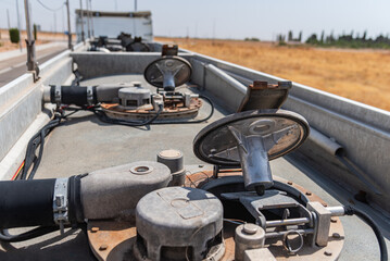 Top hatches open after interior cleaning of a multi-compartment tanker truck