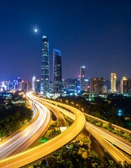 Fototapeta premium City lights over highway at night