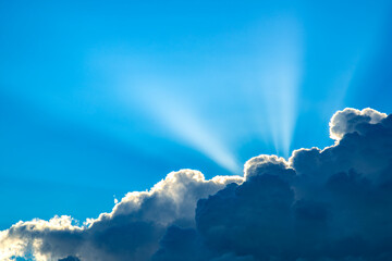 Sun's rays behind clouds