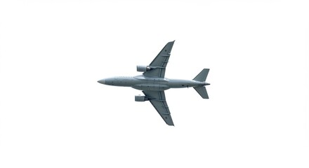 Overhead shot reveals sleek silver airplane soaring gracefully against bright white sky. AI Generated