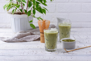 Cold matcha tea with milk and ice
