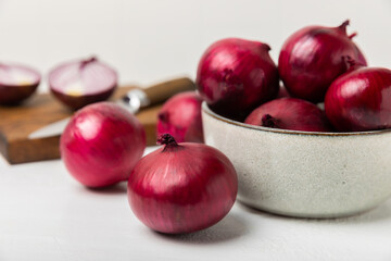 Shallot onion on the kitchen table. onion slice. onion rings. Fresh red Onion. Natural, fresh, vegetarian food. Agricultural products. Healthy eating. Vegetables. Farmer's market.