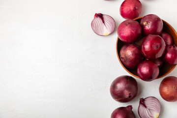 Shallot onion on the kitchen table. onion slice. onion rings. Fresh red Onion. Natural, fresh, vegetarian food. Agricultural products. Healthy eating. Vegetables. Farmer's market.