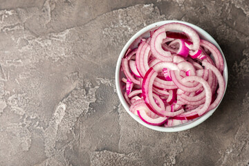 Shallot onion on the kitchen table. onion slice. onion rings. Fresh red Onion. Natural, fresh,...