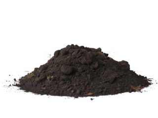Pile of dark soil with organic matter on black background