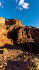 Fototapeta premium Red rock formations under a clear sky.