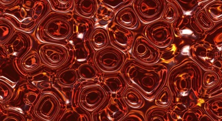 Closeup abstract texture of viscous red liquid with organic circular patterns and a glossy surface