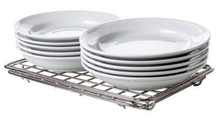 Stack of clean plates on a chrome dish rack on a white background