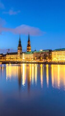 Obraz premium City skyline at dusk, reflected in water