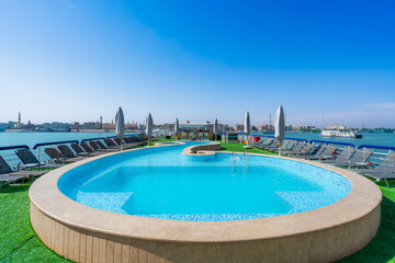 A rooftop swimming pool on a Nile River cruise ship, offering a luxurious and relaxing spot with...