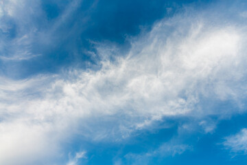 Scenic spring afternoon sky with fluffy white clouds over Esna Lock on the Nile River, Egypt. Perfect blue sky captured during cruise journey to Luxor Temple.