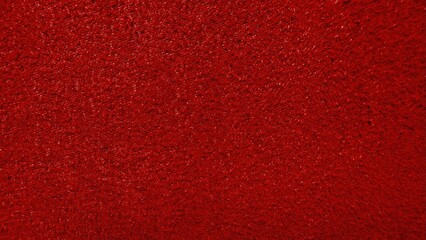 rich crimson shaggy carpet texture with deep pile detail for luxury interior design or premium...