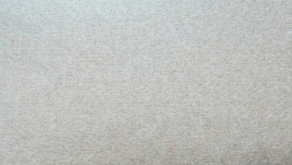 soft beige felt texture closeup with subtle fiber pattern ideal for craft design or background in warm minimalist projects