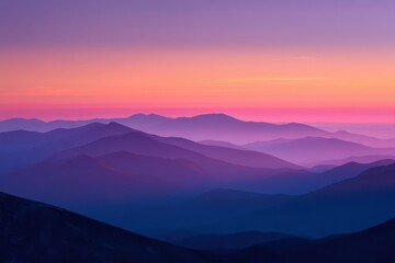 Fototapeta premium Layered Mountain Ridges in Purple and Pink Sunset Glow