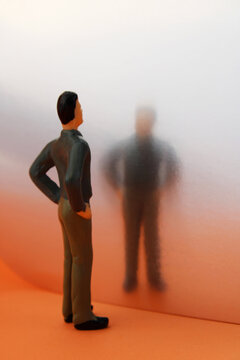 Executive sees its image reflected in a mirror