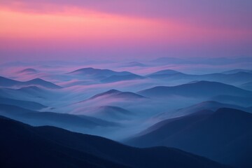 Fototapeta premium Flowing Fog Over Layered Mountain Ridges at Sunrise