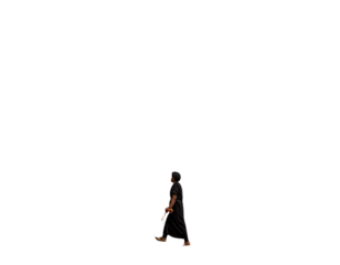 Pilgrim walking toward church on hilly landscape  