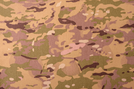Camouflage background, pattern, military wallpaper, uniform of soldiers. Camouflage background