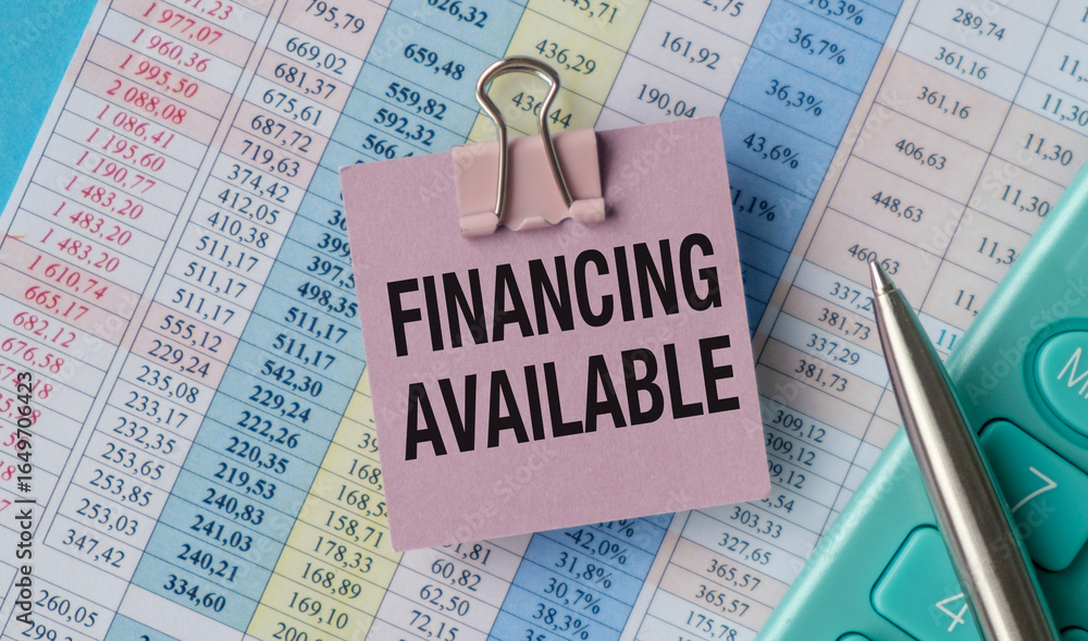 Poster a pink clip with the word financing available written on it is on top of a sheet of paper with numbe