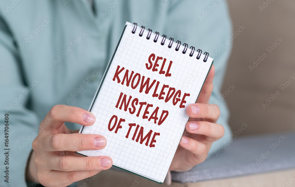 Poster a person holding a spiral notebook with the words sell knowledge instead of time written on it