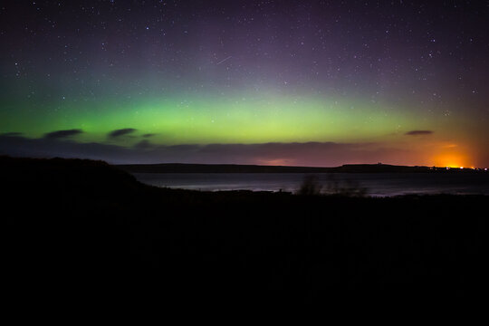 aurora borealis over the sea in Scotland
