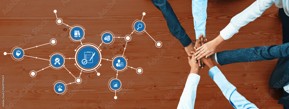 Poster a diverse team of professionals join hands in a collaborative effort, illustrating teamwork over a m