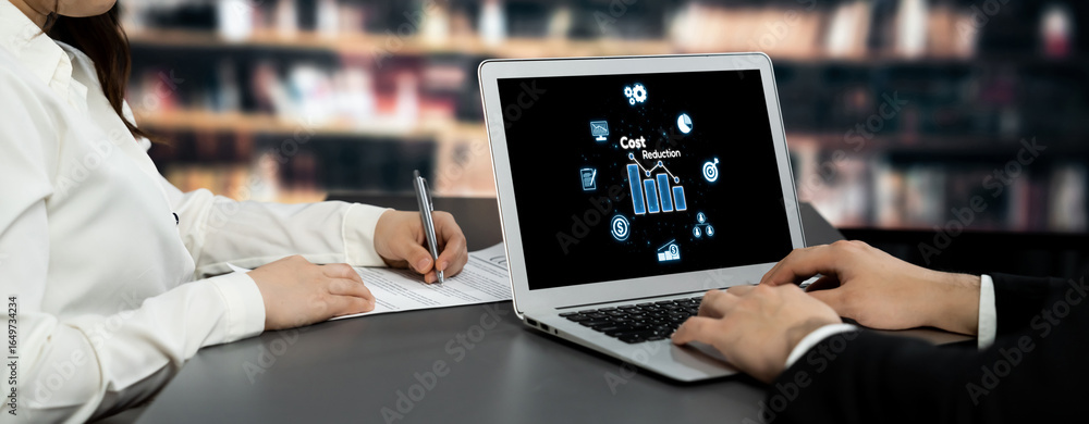 Poster cost reduction, cost saving concept shown on computer screen brisk, corporate business efficiently s