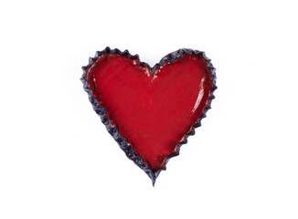 red ceramic plate in heart shape isolated on white background