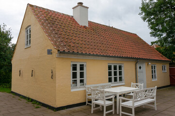Typical simple house with sloping, tiled roof. Skagen, Denmark.