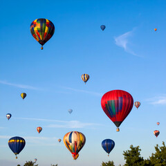 Colorful hot air balloons floating in sky
