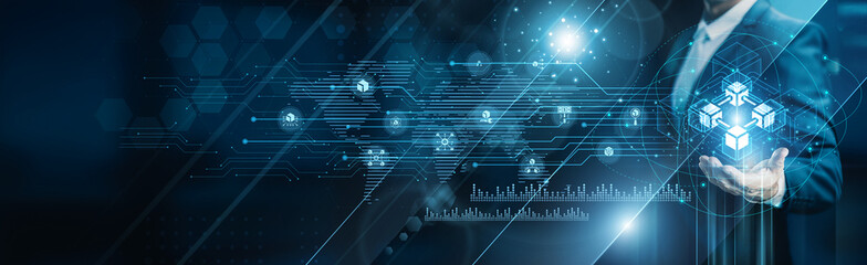 Businessman holding building of blockchain systems, decentralized ledger smart contracts crypto assets transactions data security automation transparency validation finance technology.