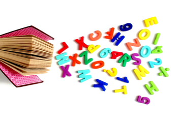 There are letters and a book on a white background.