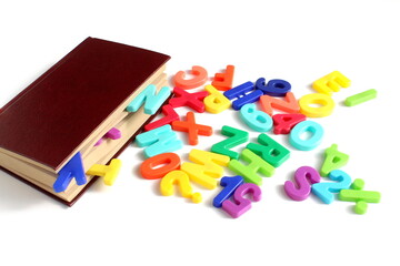 There are letters and a book on a white background.