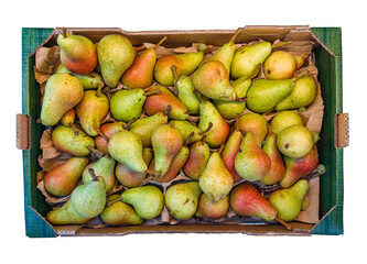 Pears Carmen in a cardboard box top view, isolated