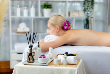 Aromatherapy massage on daylight ambiance or spa salon composition setup with focus decor and spa...