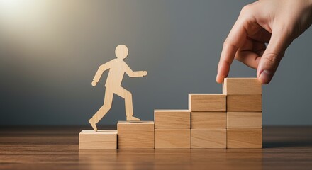 Hand helping a paper figure climb wooden stairs. A concept for business success, career growth, mentorship, and personal development.
