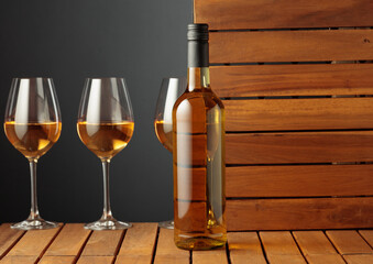 White wine on a wooden background.
