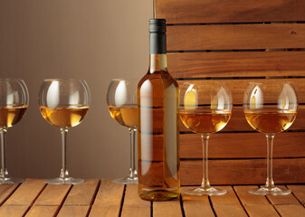 White wine on a wooden background.