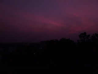 Beautiful sunset scenery view of colorful sky over the city background, nature photography, night sky wallpaper 