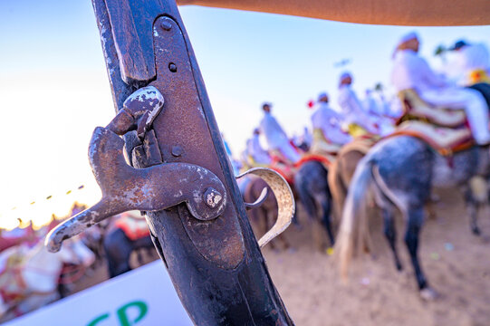 El Jadida, Morocco &ndash; 8 August 2025: Moroccan riders in traditional dress perform a fantasia (tbourida) during the annual Moussem Moulay Abdellah Amghar festival. This cultural heritage event on Morocc